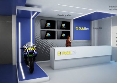 La KEY Comunicazione ha progettato e realizzato il restyling funzionale dell’ingresso della nuova sede della società GoldBet. Nell'immagine l'escena di la reception e sala di atessa in moderna con arredamento di design in colore bianco come le pareti interne. Esternamente il colore blu e una motocicletta in colori bianco e blu abbinata come arredo.